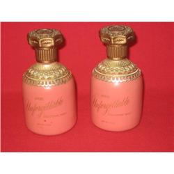 A pair of  Unforgettable perfume Bottle #1609354