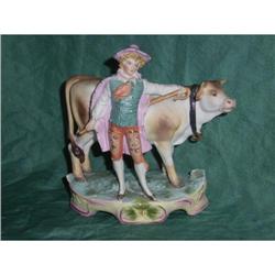 bisque porcelain figurine of a boy with his cow#1610493