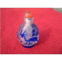 Bi-color Peking glass snuff bottle featuring a #1642021