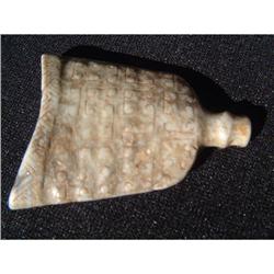 Ancient jade carving in shape of a flattened #1654015