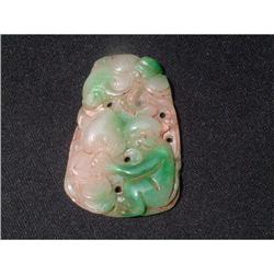 Jadeite carving featuring monkey holding pech #1654065