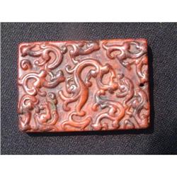 Red hardstone carving representing swimming #1654070