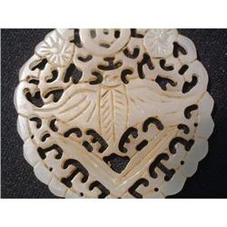 18th. century white jade disk displaying a bat #1654072