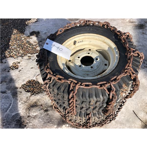 Two 23 x 9.50-12 w/ tire chains
