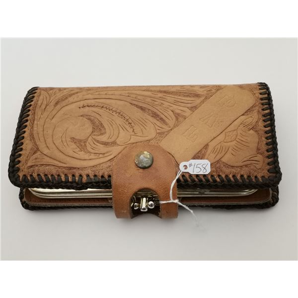 Hand tooled leather clutch, 7 ½” x 4”