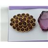 Image 4 : Articulated gold tone broach with purple glass