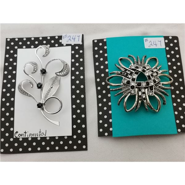 Silver tone and onyx rhinestone broaches