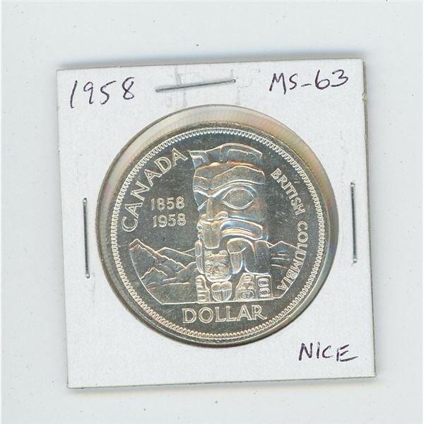 1958 Silver Dollar. Coin commemorates British Columbia and depicts a totem pole. MS-63. Nice.