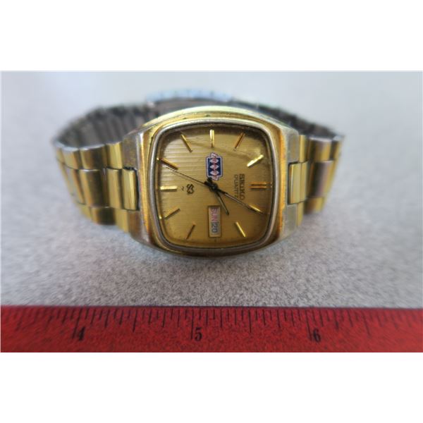 SEIKO quartz watch has month & day (face is cracked)