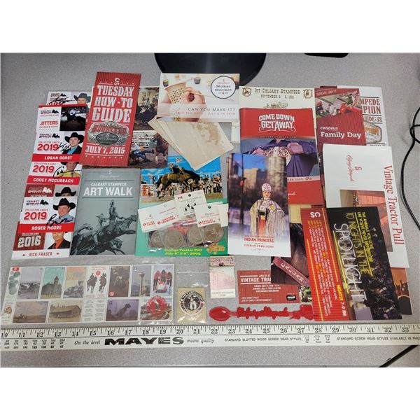 Calgary stampede lot, trade dollars, post cards, stamps, chuck wagon cards etc