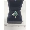 Image 1 : Dark green Zoisite ring - approx 3 karats with crystal in the middle - .925 silver mount - size 10.5