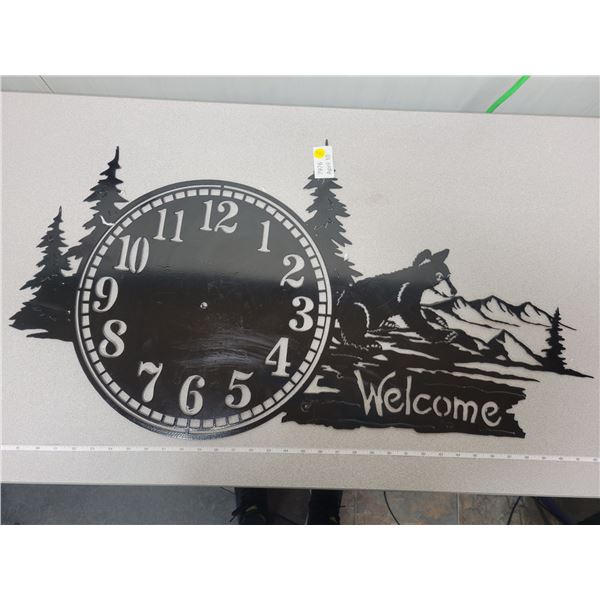 metal 'welcome' cutout sign ready to be made into a clock 36" length