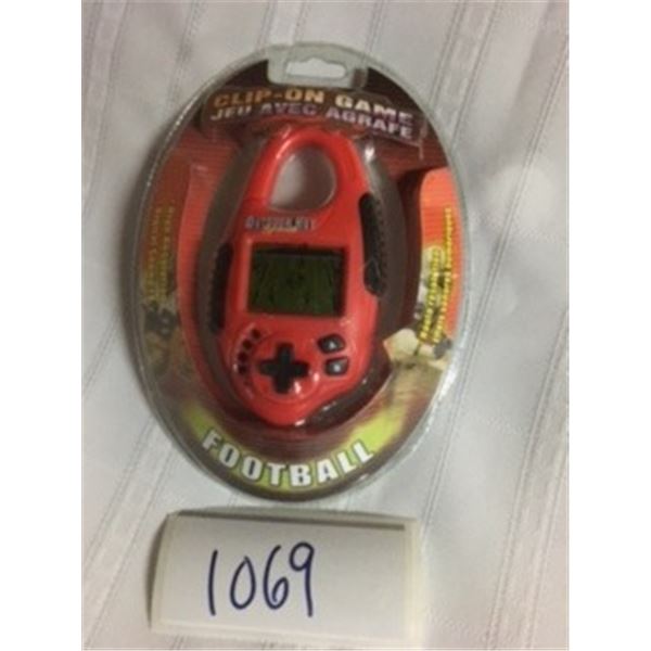 1069-COLLECTIBLE CLIP ON 2000’S OUTDOOR HOT SPORT.. FOOTBALL GAME.  FACTORY SEALED