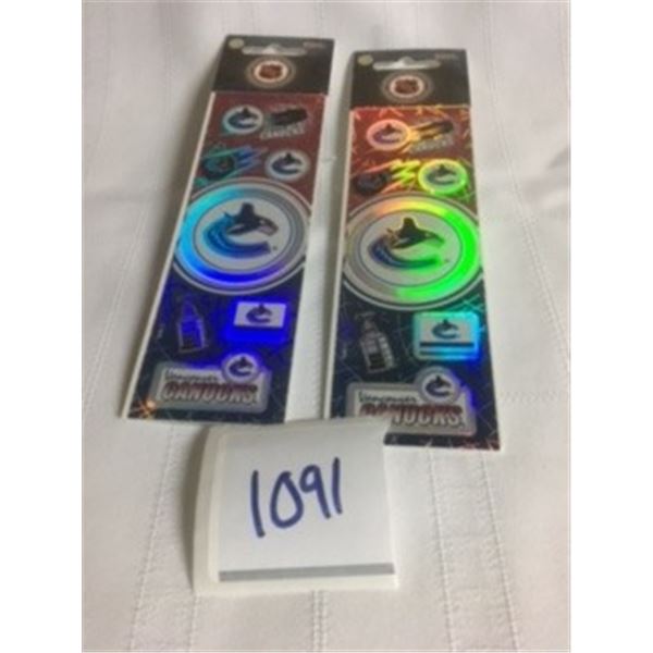 1091-LOT OF 2 SHEETS NHL HOLOGRAPHIC STICKERS VANCOUVER CANUCKS… FACTORY SEALED..