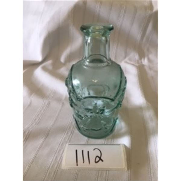 1112-GREEN GLASS FLORAL MOTIF VASE BOTTLE 7IN TALL