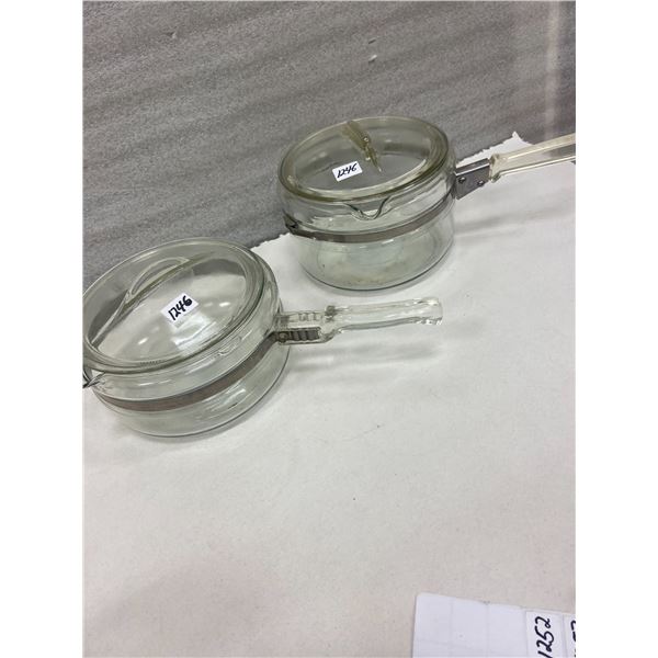 2 Pyrex glass pots & lids - 7" across 4" & 5" high