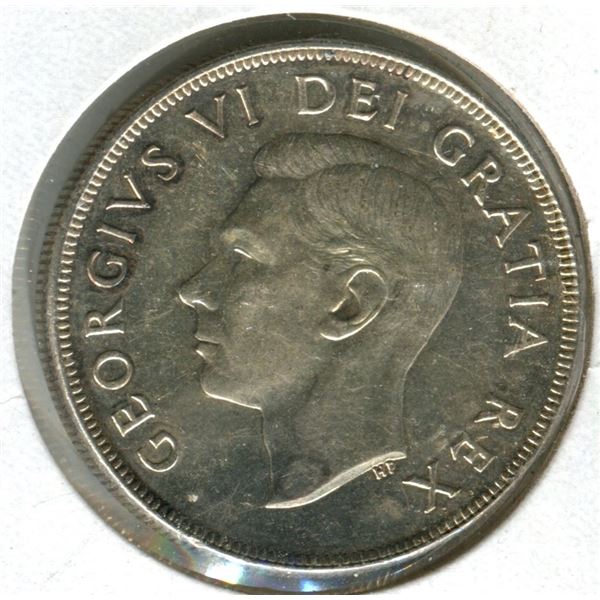 Canada 1952 dollar .800 silver M.S. 63.