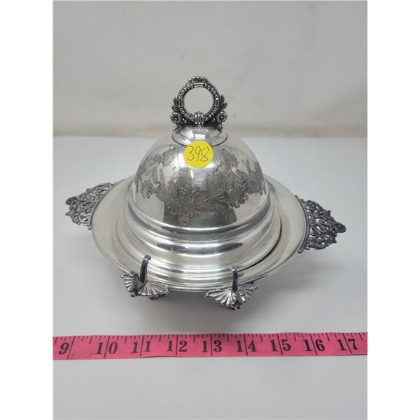 Covered butter dish, some discolorations, no butter knife. E.P.W.M. fine silverplate, extra finish