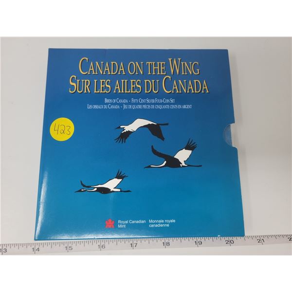 unsealed fifty cent silver four coin set (2 booklets, 2 birds each)