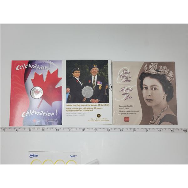 Sealed 5 Golden Jubilee 50 cent coins, veteran 25¢ coin, Celebration 25¢ coin.