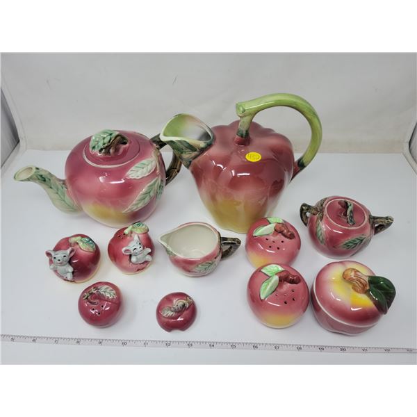 Assorted old apple dishes fairly good condition & newer apple pitcher. 2 tiny pieces broke, glued in