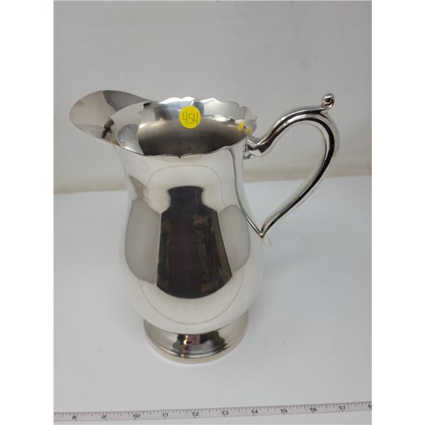 Water Pitcher with ice catcher. Marlboro silverplate. Slight dent in front of base.
