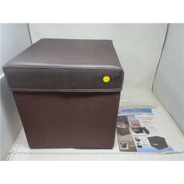 Brown ottoman with compressible storage bag, never used.
