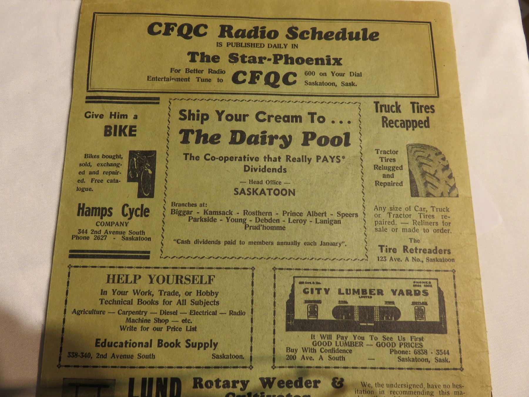 Vintage brass tire gauge letter opener old Saskatoon business, Press