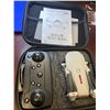Image 7 : NEW in Case foldable HD Video Drone with controller and accessories.Â 