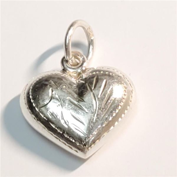 Silver Heart Shaped Necklace (~length 18inches), Suggested Retail Value $160