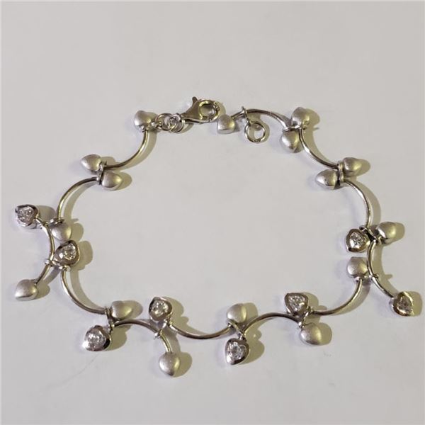 Silver Cubic Zirconia Bracelet (~length 7.5inches) (~weight 7g), Suggested Retail Value $300 (Estima