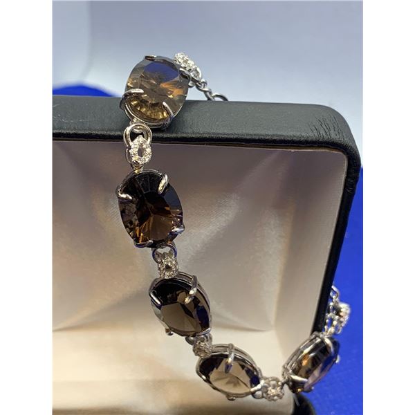 Natural Smokey Quartz 36.10 Carat Oval Cut Gemstone Bracelet, stamped 925 Silver certificate Value $