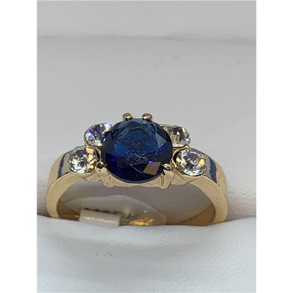 Ladies Blue Topaz Style Round Cut Gemstone 14K GP Ring