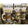 Image 2 : 6 ASSORTED STEINS (BUDWEISER HOLIDAY IN THE MOUNTAINS, AN AMERICAN TRADITION, LIGHTING THE WAY