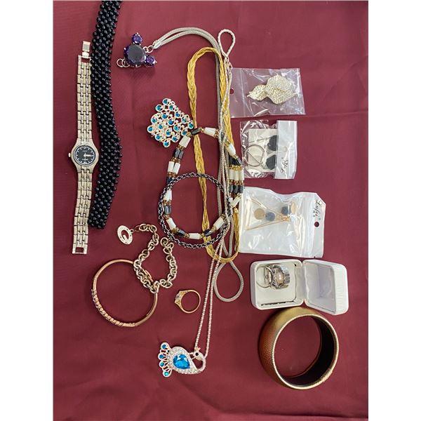 bag of assorted costume jewelry