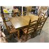 Image 2 : SOLID OAK TABLE WITH 2 LEAF INSERTS & 6 CHAIRS 65 X 40"