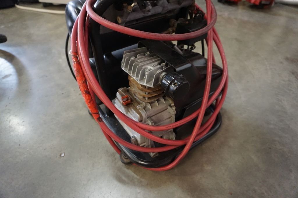 Powerbuilt Air Compressor Powerbuilt dual tank air compressor and hose - Big Valley Auction