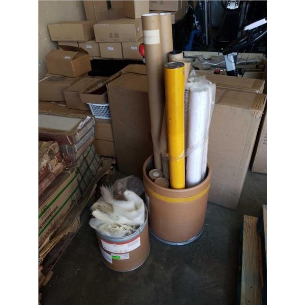Cardboard barrel of plastic bags and a lot of cardboard tubes