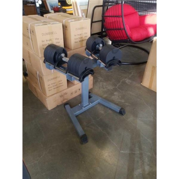 BRAND NEW PAIR OF ADJUSTABLE DUMBELLS W/ STAND UP TO 70LBS EACH RETAIL $899