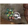 Image 2 : Sunburst wall hanging and carved mask with duster and wind chime