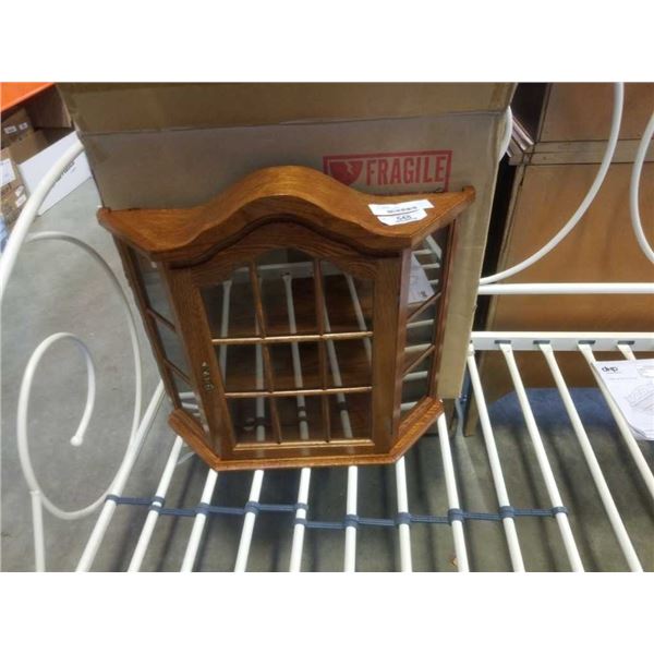 Oak frame curio cabinet