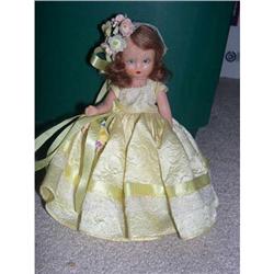 Nancy Ann Black Sleep Eye doll in yellow #1635169