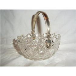 Antique crystal  bowl with silver handle. #1637086