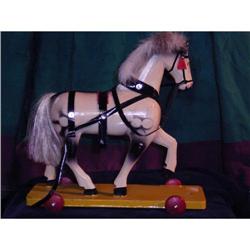 wooden horse on wheels #1637099