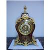 Image 1 : A French bronze-mounted red boulle mantel clock#1616117