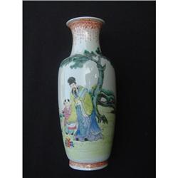 Antique porcelain vase with figural design #1640946