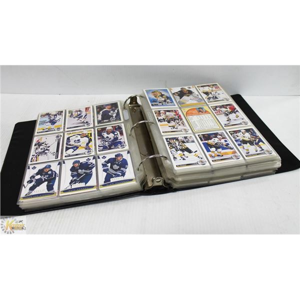 OVER 1000 HOCKEY AND BASKETBALL CARDS IN BINDER