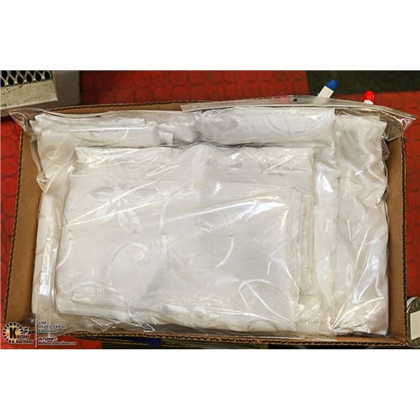 LOT WITH 6 PANELS OF WHITE DESIGNED CURTAINS
