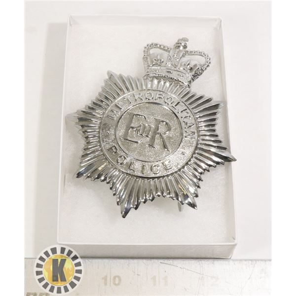 LONDON UK. BOBBY HELMET BADGE