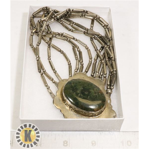 LARGE MULTI-STRAND COSTUME NECKLACE W/STONE